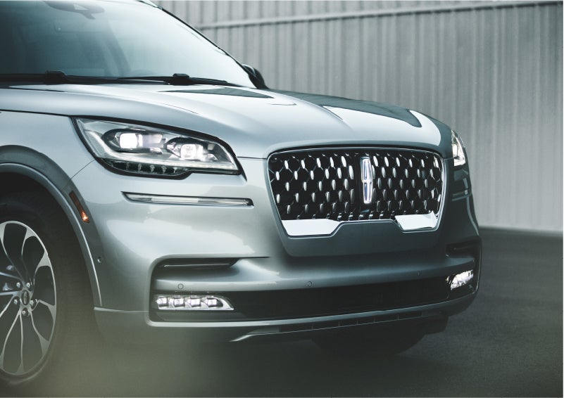 The available adaptive pixel LED headlamps of the 2023 Lincoln Aviator® SUV activated | Mike Carpino Lincoln in Pittsburg KS