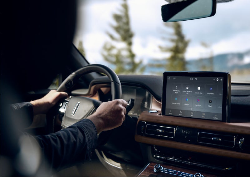 The Lincoln+Alexa app screen is displayed in the center screen of a 2023 Lincoln Aviator® Grand Touring SUV | Mike Carpino Lincoln in Pittsburg KS
