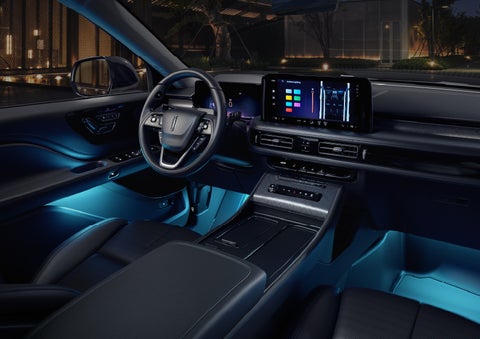 Deep blue Ambient Lighting glows from various places within a 2026 Lincoln Aviator® SUV. | Mike Carpino Lincoln in Pittsburg KS