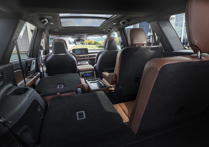 One side of the PowerFold® third-row seat and a second-row seat are folded forward in the 2026 Lincoln Aviator® SUV. | Mike Carpino Lincoln in Pittsburg KS