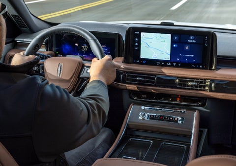 A person is driving a 2026 Lincoln Aviator® SUV as seen from inside the cabin. | Mike Carpino Lincoln in Pittsburg KS