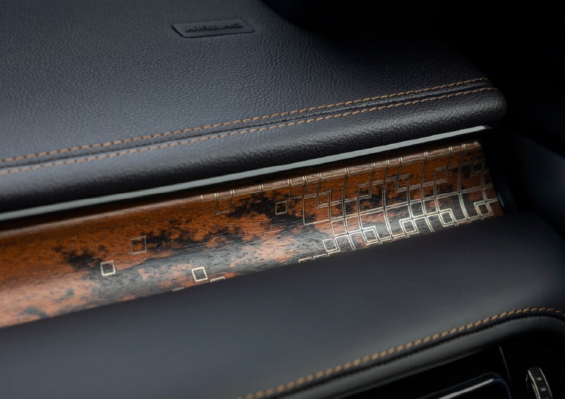 A close-up shot of the 2026 Lincoln Aviator® dashboard with unique black and brown accents and brown stitching. | Mike Carpino Lincoln in Pittsburg KS