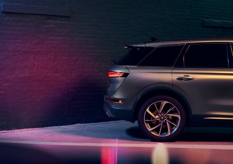 A dramatization of a 2026 Lincoln Corsair® SUV backing up toward a wall is shown. | Mike Carpino Lincoln in Pittsburg KS