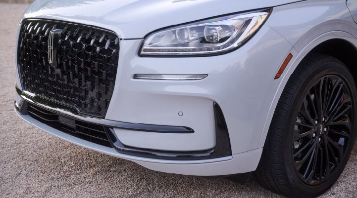 The all-black grille of the available Jet Appearance Package on a 2026 Lincoln Corsair® SUV is shown. | Mike Carpino Lincoln in Pittsburg KS