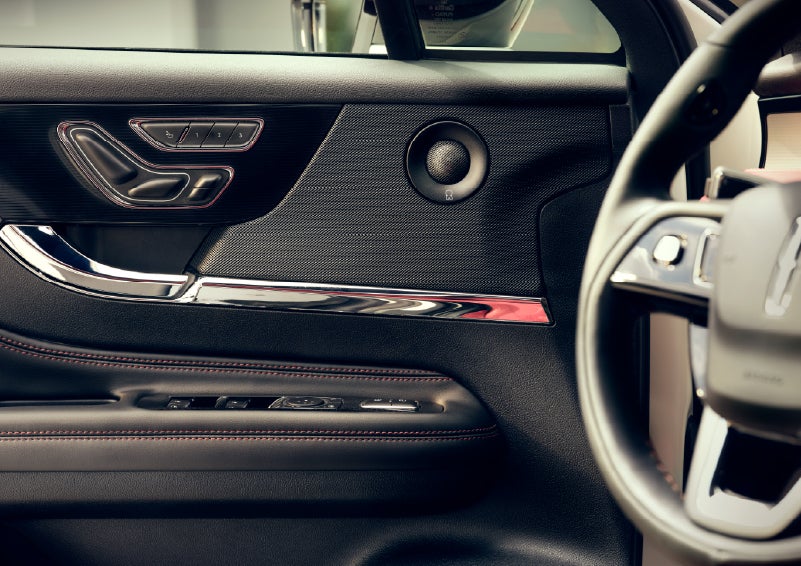 An audio speaker is shown in the driver's side door of a 2026 Lincoln Corsair® SUV | Mike Carpino Lincoln in Pittsburg KS