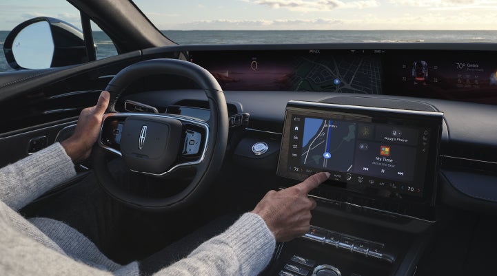 The driver of a 2026 Lincoln Nautilus® SUV interacts with the new Lincoln Digital Experience. | Mike Carpino Lincoln in Pittsburg KS