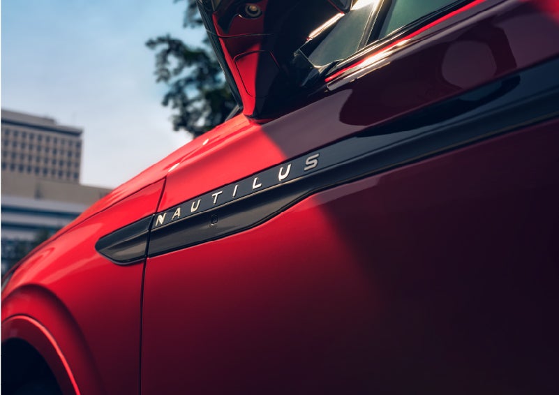 A side badge on the passenger door reads Nautilus. | Mike Carpino Lincoln in Pittsburg KS