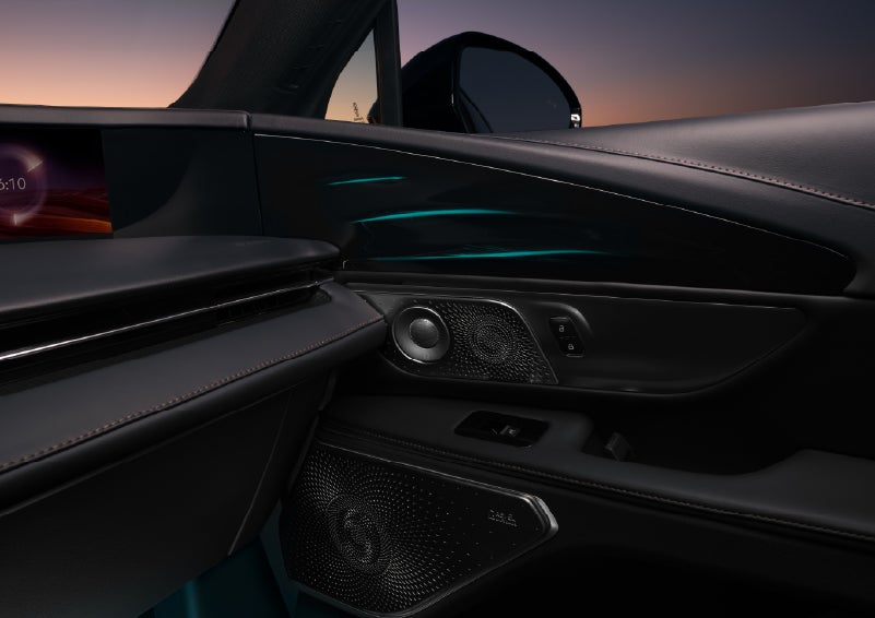 Selectable ambient lighting glows in the passenger door panel. | Mike Carpino Lincoln in Pittsburg KS