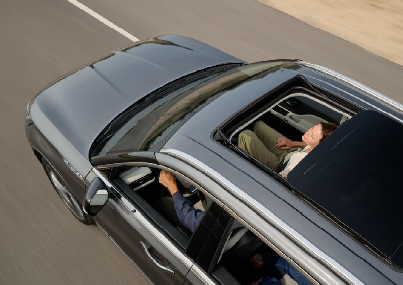 The available panoramic Vista Roof® of a 2027 Lincoln Aviator® SUV is open. | Mike Carpino Lincoln in Pittsburg KS