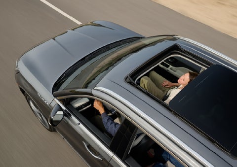 The available panoramic Vista Roof® of a 2027 Lincoln Aviator® SUV is open. | Mike Carpino Lincoln in Pittsburg KS